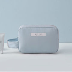 travel makeup bag light blue